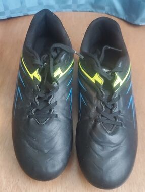 Boys Black Athletic Soccer Shoes with Yellow Accents